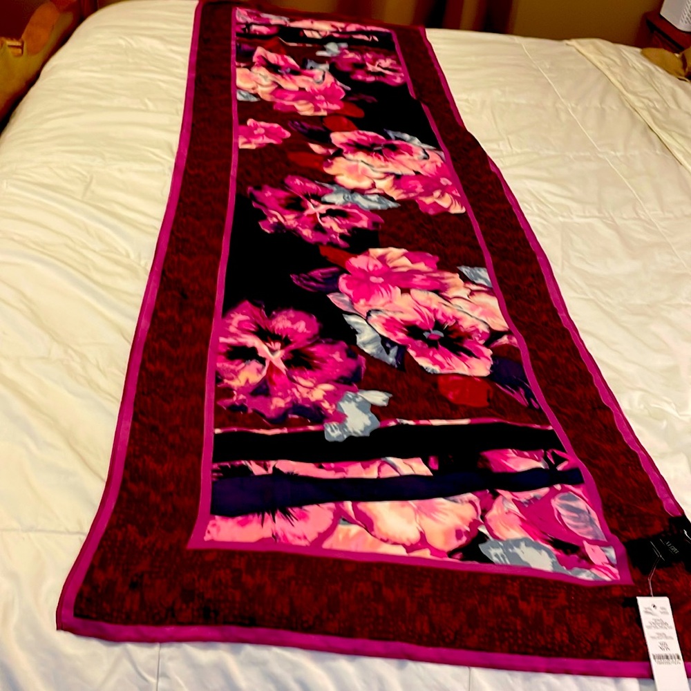 This is a Beautiful Scarf new with tags, I have two of them.